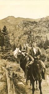 John horseback riding in the Rockies, mid 1930s. (His sister, Eleanor, is at the far back.)
